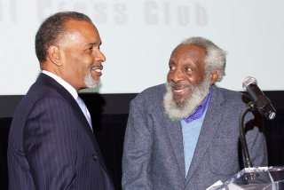 Dick Gregory, right, introduces honoree Joe Madison of Sirius XM at a Capital Press Club gala in Washington in 2014. (Capital Press Club)